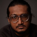 MADHU, Director