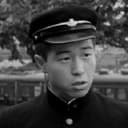 Kazuhiko Kasai als Checkpoint Policeman