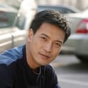 Wang Haidi als Zhang Xiangyang as a 30 year old man