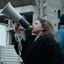 Michela Criscuolo als Protester with Megaphone