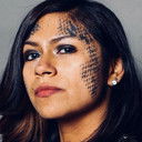 Elizabeth D. Medrano als Delmi Exo