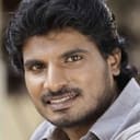 Dhileban als Saravanan