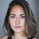 Lara Telli als Portabella's Hostess