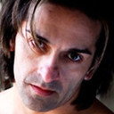 Tony James als Nervous Caveman