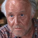 Laurence Naismith als Reverend Angus Paddie