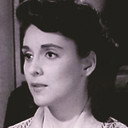 Laurie Carroll als Della