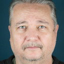 Mike Harkins als County Clerk