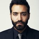 Alain Ali Washnevsky als German Desk Clerk