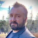 Elliott Van Dusen als Paranormal Research Specialist
