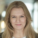 Anette Martinsen als Norwegian Female Newscaster
