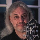 Manni Schmidt als Guitars, Backing Vocals