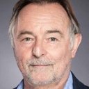 Ron Cook als Derek Ryder