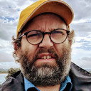 Daniel Kitson als Spencer