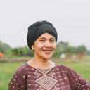 Dennise Sihombing als Bu Nur/Mrs. Nur (Bagas Mother)