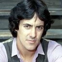 David Naughton als Dunn