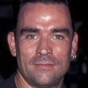 Trevor Goddard als T. Ray