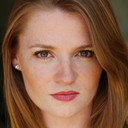 Cara Reid als June