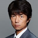 仲村トオル als Dr. Takahito Taneda