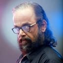 Peethambaran Menon als Siva's & Siddhu's Father