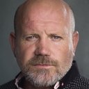 Adam Fogerty als 