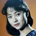 Yujin Liang als Mrs. Gan