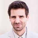 Mel Raido als Bryan Metro