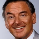 Bob Monkhouse als Space Navigator Brad Newman / Swinging Star Compere (voice)