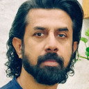 Nilesh Divekar als Raja