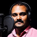Raghuraj R Nair als Bigg Boss (voice)