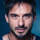 Riccardo Berdini als Tom