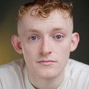 Kane O'Connell Flynn, Assistant Director