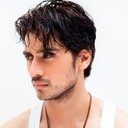 Shiv Panditt als Faiz Abu Malik