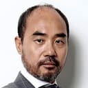 Kang Shin-il als Director Jo