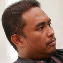 Azizul Rahman Mahfudz als Boss