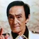 Toshiaki Nishizawa als Commander Qom