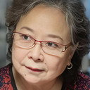 Li Mingzhu als Supermarket Owner