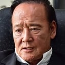 金田時男 als Mr. Chang