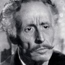 Lauro Gazzolo als The conductor on the train