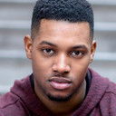 Dondre Octave als Ralph Metcalfe