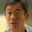 Li Xinmin als Farmers's Leader