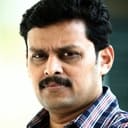 Ranjith Sankar als film director (cameo)