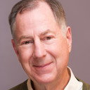 Doug Cox als Minister Lawrence
