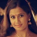 Devika Nambiar als Rosy