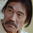 Tony Le Nguyen als Huang