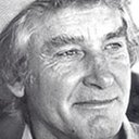George Orrison als Café Patron