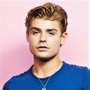 Garrett Clayton als Sean Paul Lockhart / Brent Corrigan