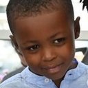 Milan Doucansi als Ernest (age 5)
