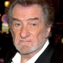 Eddy Mitchell als Maurice Bruno, referee