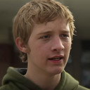 Jace Rowley als John (Ron Joost)