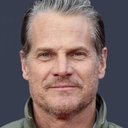 Brian Van Holt als Warren Mulaney
